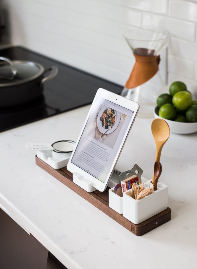 Solid surface counter top with an iPad open to a recipe